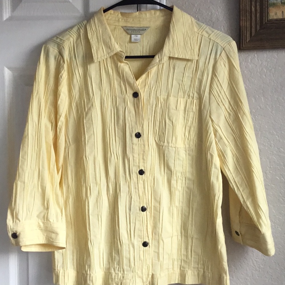 Yellow 3/4 sleeve top or jacket.
